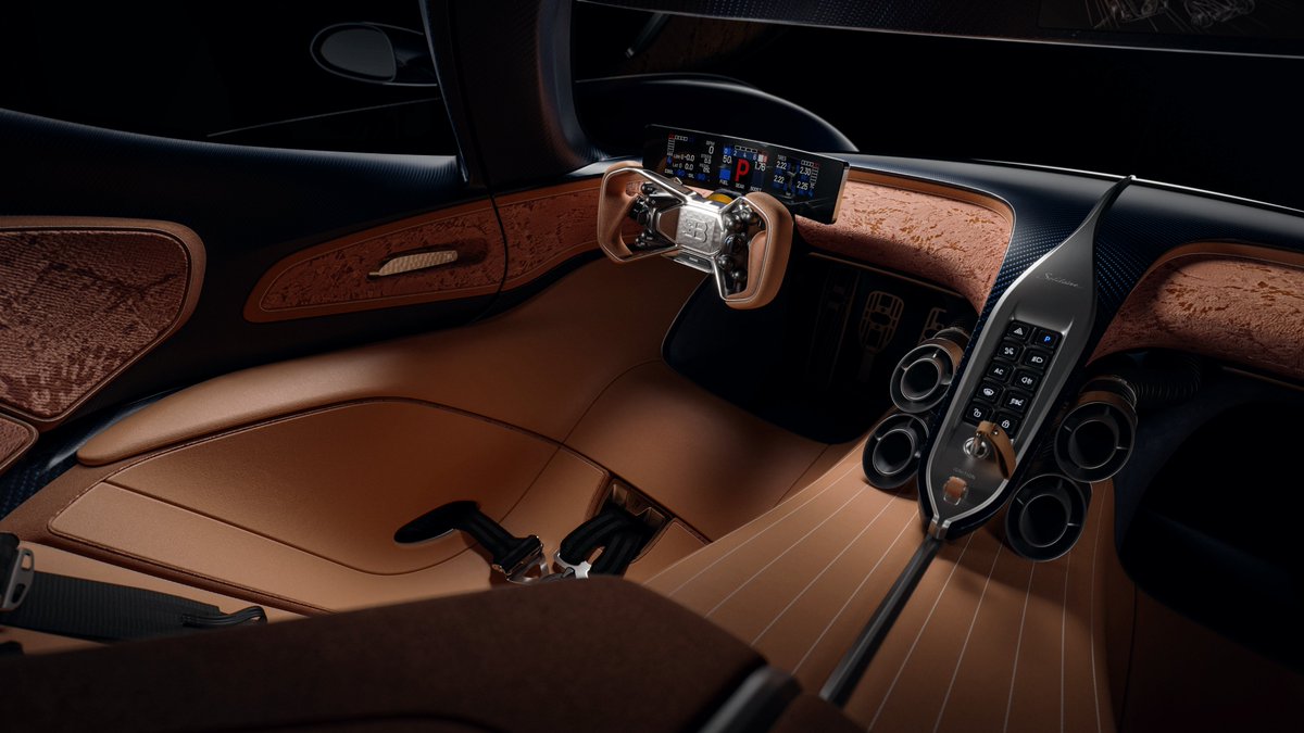 Motor1com's tweet photo. Bugatti turned its track car into a rolling sculpture. Meet the Destrier, its third custom creation from ultra-exclusive Programme Solitaire.

• Based on the Bolide
• 1,578 Horsepower
• Lowest Bugatti ever at 39.4 inches tall

More details: https://t.co/tTbLMzm2mI https://t.co/1kJ9k1l2Qf