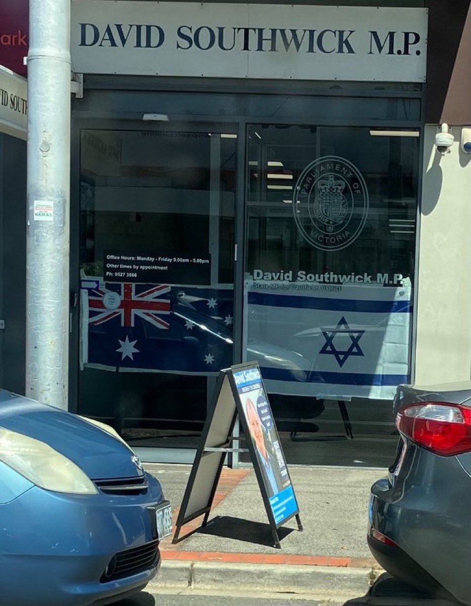 Partisangirl's tweet photo. Why is an Australian MP waving a foreign flag? https://t.co/0So2DahSft
