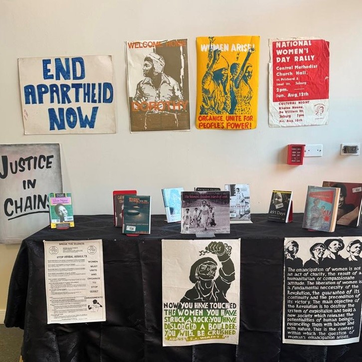freedomparksa's tweet photo. "Her Story, Our Story, Our History" exhibition honours the courage and resilience of South African women through books and powerful Medu Art Ensemble posters. Visit Freedom Park this #WomensMonth to explore the stories of the women who shaped our history. #freedomparkheritagesite https://t.co/Rd7oGWRJ2F