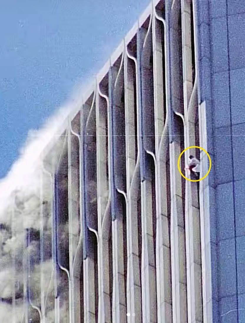 Daytobehappy's tweet photo. In the right hand corner encircled you can see a man waving what appears to be a cloth from the Windows on the World restaurant where many were trapped on 9/11. In so many videos you see this poor gentleman and I've always wondered if he continued to do that until the tower crashed or he jumped to his death to get away from the inferno. It was such a day of horror and it's even more horrible that people have forgotten so quickly because they heard they could ride the bus for free! New York City may have forgotten but we never will!