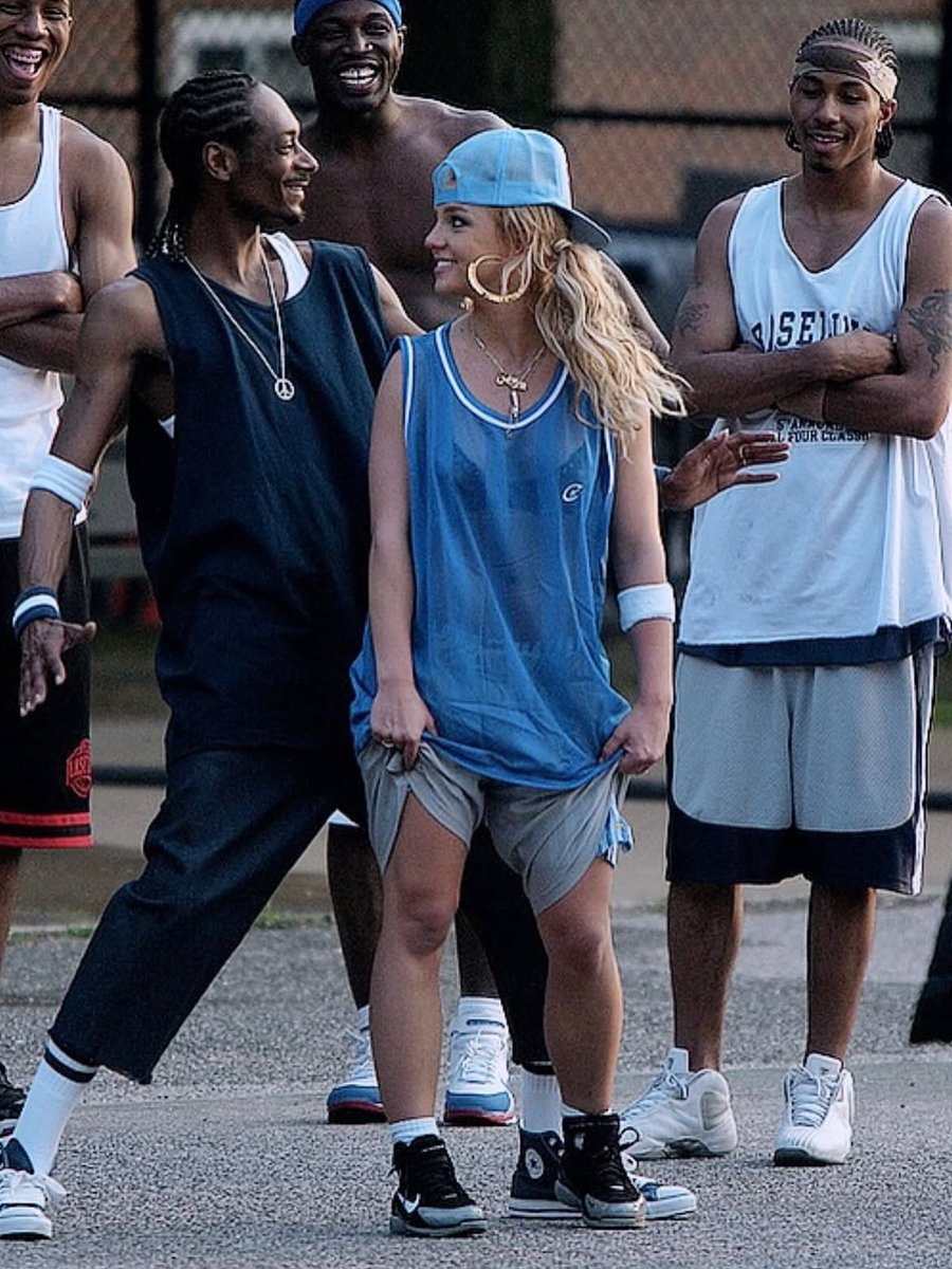 historyinmemes's tweet photo. Britney Spears on the set of her “Outrageous” music video in 2004.

Unfortunately, the project was never completed as originally planned.

After Snoop Dogg finished filming his scenes, Britney Spears suffered a serious knee injury while performing a demanding dance sequence later that night in Manhattan. The injury required surgery, forcing production to shut down before the music video could be fully completed.