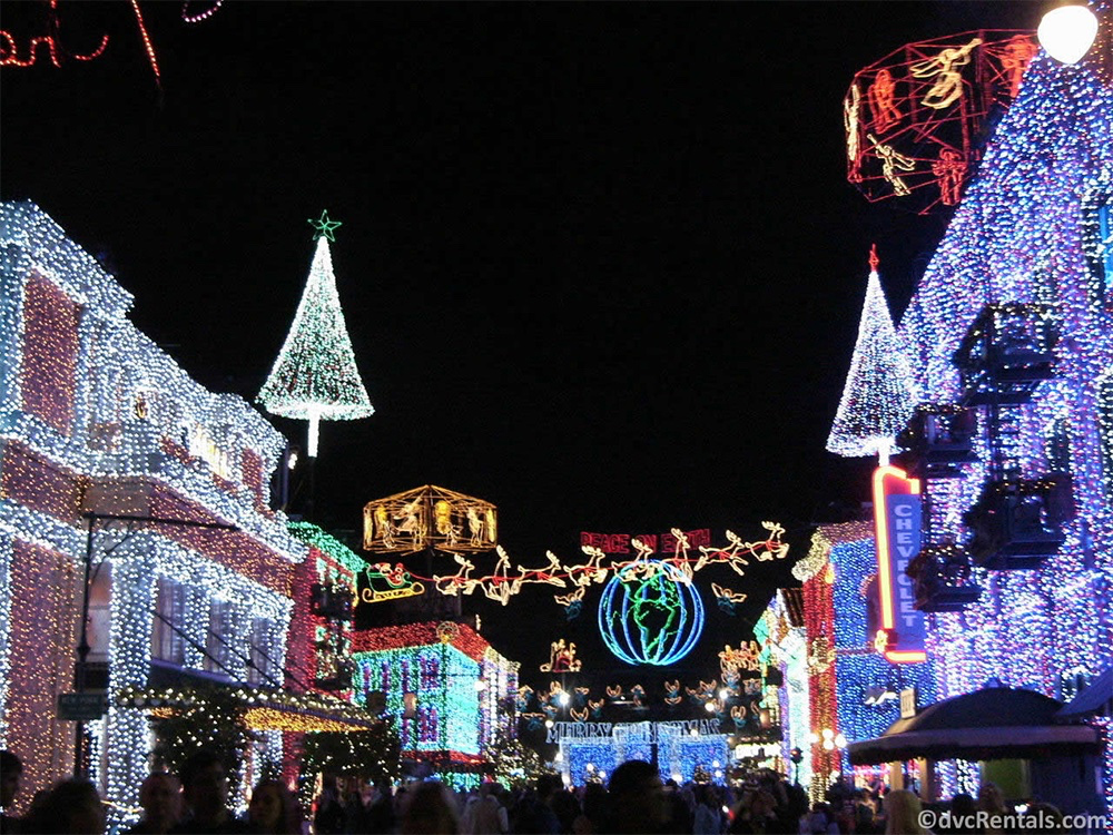 UncleWalt1971's tweet photo. Holidays at Disney’s Hollywood Studios are still just not the same without the Osborne lights. We got to see them several times, and they were impressive. 

The lights started as a private backyard light show by Jennings Osborne in Little Rock, Arkansas. By 1993 it had grown to over 3 million lights, including a 70-foot tree and two rotating carousels of lights, so large it caused traffic problems for his neighbors. 

When Disney invited the display to Orlando for the 1995 holiday season, it was installed on the park’s “Residential Street” back-lot (calling it the "Osborne Family Spectacle of Lights"), later moving to Streets of America, and eventually grew to more than 5 million lights, and included synchronized “dancing” sequences matched to music.  

The display used over 10 miles of rope lighting and 30 miles of extension cords, held together by more than 2 million cable ties. At full scale, the lights required about 800,000 watts of electricity each night. In 2006, the show was upgraded with approximately 1,500 dimmer/relay circuits so the lights could be synchronized (“dance”) to holiday music. When the display was moved from the “Residential Street” back-lot to the “Streets of America” section (in 2004), artificial “Florida snow” machines (about 33 machines) were added as an atmospheric effect. 

 In 2015 Disney announced that holiday season would be the last because of the construction of Galaxy’s Edge. The majority of the lights were donated to the Give Kids the World Village in Kissimmee. Although many Disney fans believe some of the Osborne Lights eventually found their way to Silver Dollar City in Branson, Missouri, neither Disney nor Silver Dollar City has ever confirmed that any of the original display was transferred there.