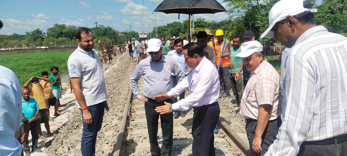 drm_tsk's tweet photo. GM/NFR, accompanied by DRM/Tinsukia, reviewed the progress of restoration work at the railway track affected by the recent floods. Officials assessed ongoing efforts and emphasized the early restoration of rail connectivity, ensuring safe and seamless train operations. https://t.co/TQIjn8QBOk