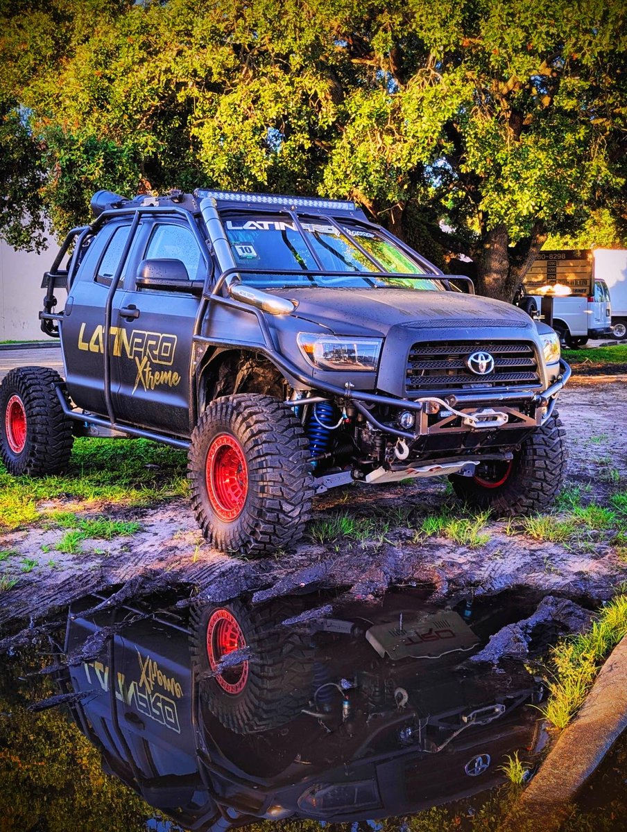 mcanasp16's tweet photo. One of the craziest Toyota Tundras I've spotted in Miami. 🤯
This build features a full exo-cage, winch bumper, snorkel, long-travel suspension, remote reservoir shocks, oversized mud tires, beadlock-style wheels, rock sliders, and enough clearance to tackle almost anything. https://t.co/rZ7VV5Y9KB