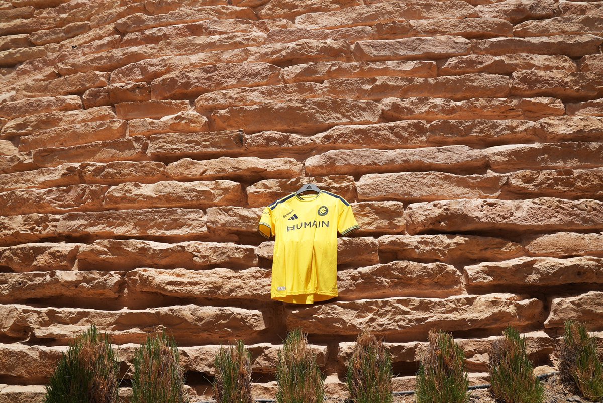 AlNassrFC_EN's tweet photo. More than our colours.
A symbol of who we are. 💛💙

The official Nassr 26/27 Home Kit.
Wear the Spirit of Najd.

 Dropping tomorrow online and at Nassr stores. https://t.co/Qe4lPHnguE
