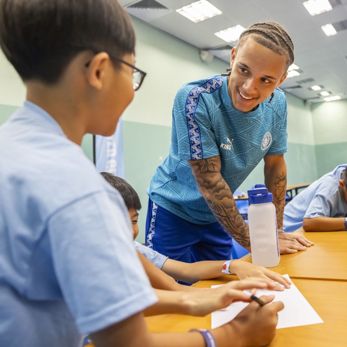 ManCity's tweet photo. Our players and @citcmancity coaches joined 200 children for a special community football festival in Hong Kong 🩵🇭🇰 https://t.co/kRjX3t6Ekx