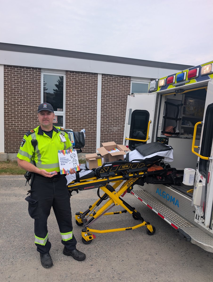 ADPS911's tweet photo. #ADPS Paramedics attended an event in Elliot Lake over the long weekend providing the kiddos with colouring books and crayons! Thank you to Paramedics Marty &amp; Nithin for your community spirit! https://t.co/G8HhZ7Lair