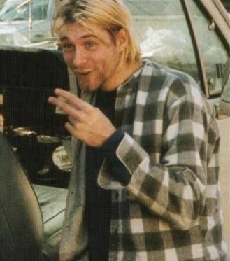 historyinmemes's tweet photo. When Nevermind was released in 1991, Kurt Cobain was far from living the life of a rock star. He had been evicted from his apartment and was reportedly living out of his car as Nirvana’s breakthrough album began changing music history.

In the summer of 1991, shortly after returning from Los Angeles where Nirvana had recorded Nevermind, Kurt Cobain was evicted from his apartment in Olympia. He came home to find his belongings—including clothes, lyrics, and musical equipment—packed into boxes and left on the sidewalk because he could no longer afford the rent.

For the following weeks, Cobain lived out of his 1963 Plymouth Valiant and stayed on friends’ couches, struggling financially just as he was on the verge of releasing a major-label album that would change music forever.

When Nevermind arrived in September 1991 and became a worldwide sensation, Cobain’s circumstances changed dramatically. However, the eviction remains one of the most well-known reminders of the difficult period he endured before finding fame.