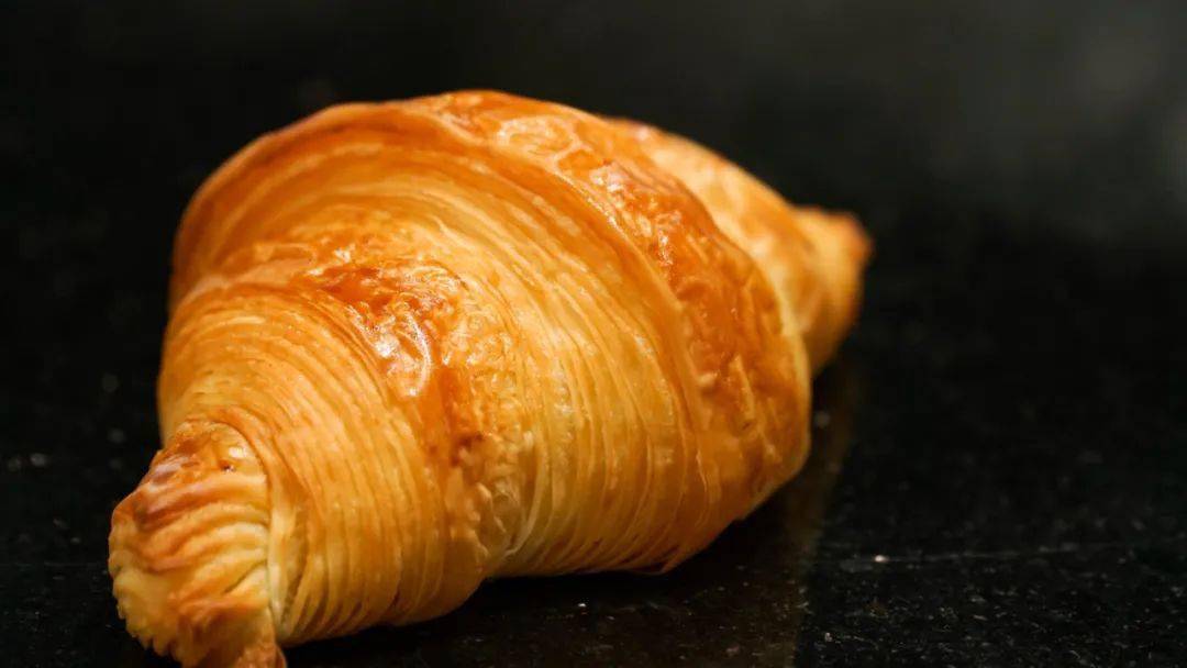 AMacalipat's tweet photo. Biting into a warm, buttery croissant at a sunlit Paris café—simple joy hits different! https://t.co/rZI57ykWiu