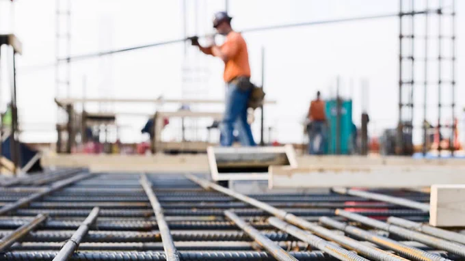 Ironworker prepping rebar for poued concrete floor