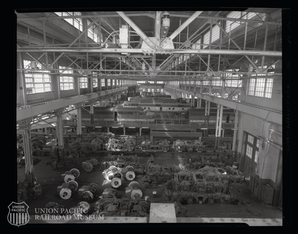 UPRRMuseum's tweet photo. Missouri Pacific’s diesel shop at North Little Rock,  Arkansas, 1955.  

These locomotives were getting an overhaul. https://t.co/gKIqrjJRGU