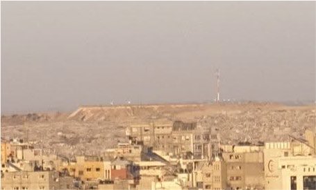 Tamer_Alnoaizy's tweet photo. This is the crane I mentioned in my post.

These are the scenes you won't see on the news or find in the pages of most newspapers around the world.

What is happening here goes far beyond what the world is being shown. The reality on the ground is far more horrifying, and far harsher than you can imagine.