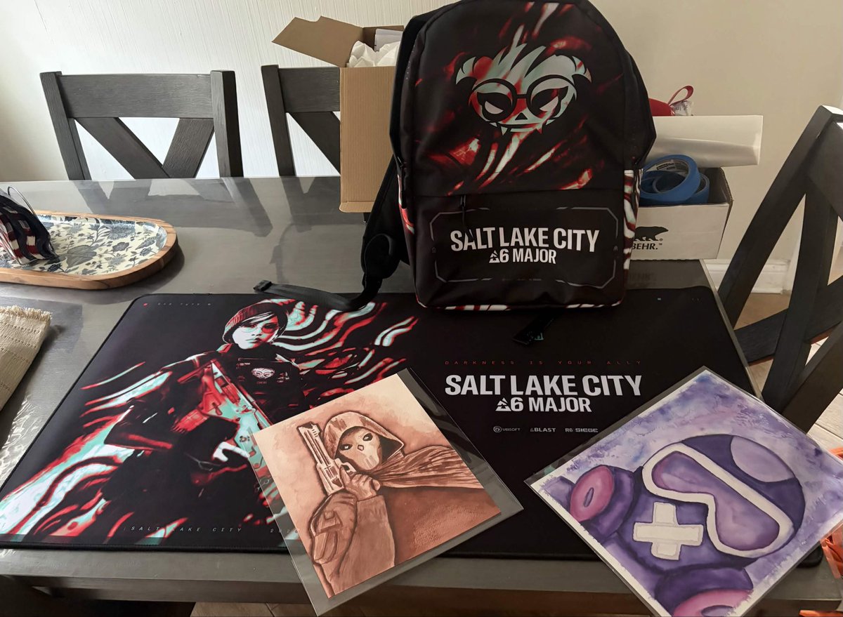 PurfiedxGaming's tweet photo. This is why @SenValeTV is my favorite all time streamer…. Purchased 2 painting off his wife got the package today and it wasn’t just 2 painting I got a salt lake major book bag and pc mat.. @Ubisoft  this man deserves an operator skin.. Senvale once again Thankyou! https://t.co/9XPf7ZfMxO