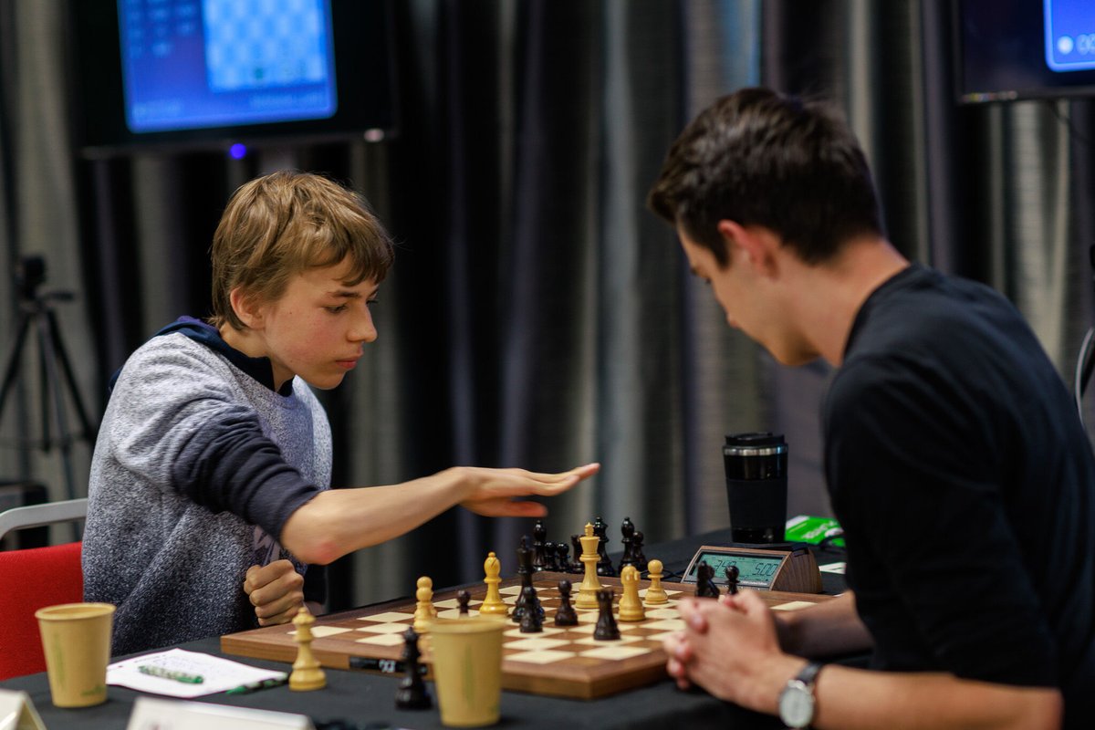 ecfchess's tweet photo. ♟️ Three rounds to go.
You can feel the tension building at the British Chess Championships.
Players are lingering a little longer at the pairings, taking more walks around the playing hall... and if you look under the tables, there's definitely a lot more feet shaking... https://t.co/JXKtMl55pl