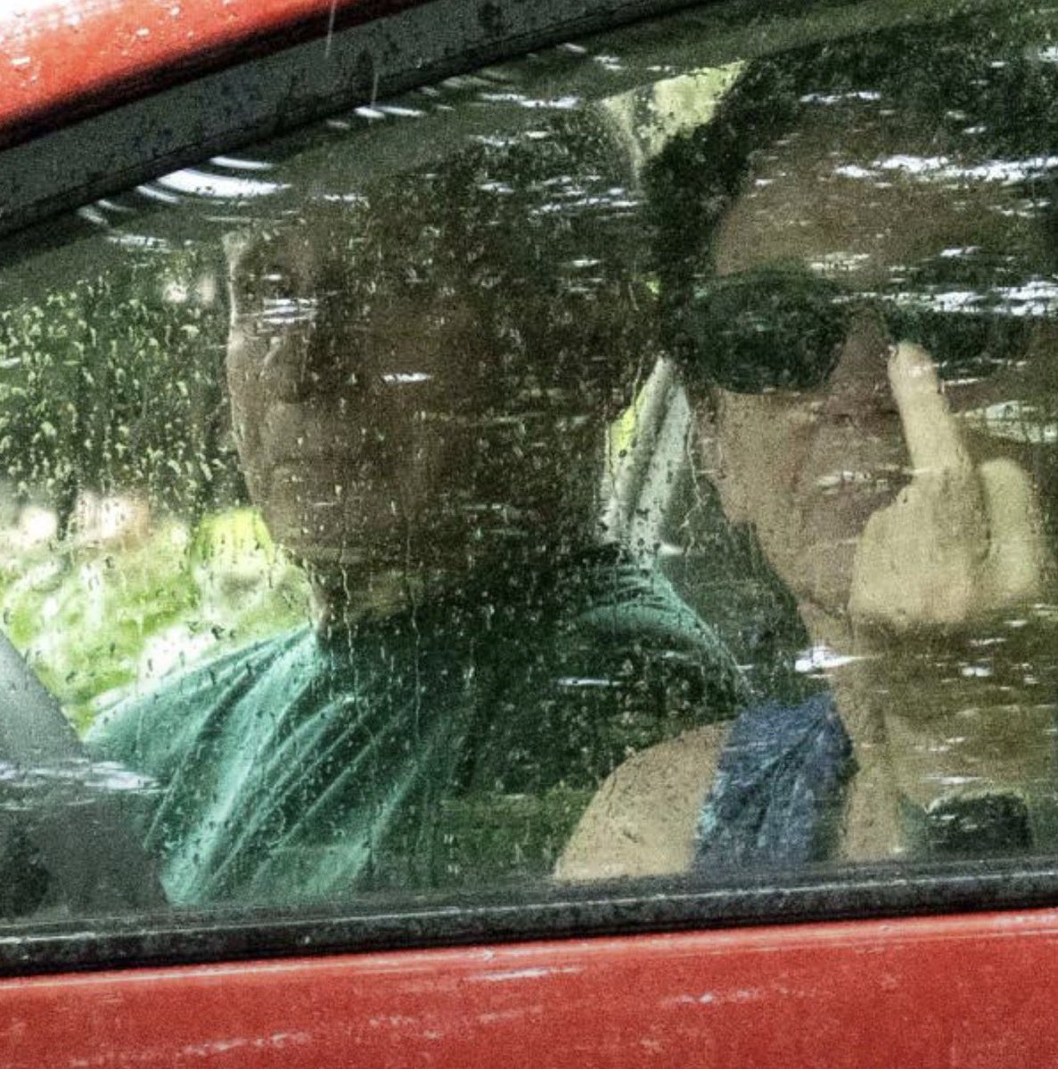 krassenstein's tweet photo. Dr. Fauci’s wife flips the bird at conspiracy nuts at their home. 

Good for her. https://t.co/zWtDjRlQtJ