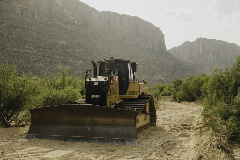 LaikenJordahl's tweet photo. BREAKING: Federal Contractors Begin Border Construction in Big Bend National Park

TERLINGUA, Texas— Bulldozers broke ground today on border barrier and road construction in Big Bend National Park amid widespread bipartisan opposition. Videos shared with the Center for Biological Diversity show contractors plowing through native vegetation along the Rio Grande’s riparian corridor, with the iconic Santa Elena Canyon visible in the background.

“This is the most heinous attack on an American national park in generations,” said Laiken Jordahl, national public lands advocate at the Center for Biological Diversity. “The administration is preparing to blast hundreds of miles of destructive roads through the wildest place left in Texas and cut off public access to the Rio Grande, all to enrich private contractors. Big Bend belongs to us all, and sacrificing it is a betrayal of every Texan and every American who believes our national parks should be protected. We won’t stop fighting this reckless assault on Big Bend National Park and America’s natural heritage until this destruction ends.”

Department of Homeland Security contractors have stockpiled heavy equipment across the Big Bend region, where staging yards have been cleared, worker camps built and water wells drilled.

According to Customs and Border Protection’s online map, the agency plans to build vehicle barriers and patrol roads across Big Bend National Park, including in rugged and remote areas such as Mariscal Mountain that would require extensive dynamite blasting. The plans also include building in remote walled canyons where no unauthorized vehicle crossings have been documented and where vehicles cannot access the border with Mexico.

In May the Department of Homeland Security awarded a $1.7 billion contract for border work through the national park. In June the department waived dozens of environmental laws — including the National Park Service Organic Act, Endangered Species Act and National Wild and Scenic Rivers Act — to authorize construction of border barriers, roads and lighting through Big Bend National Park. It was the first time in U.S. history that the federal government had waived such a broad set of environmental protections for construction inside a national park.

The Center sued the Department of Homeland Security, saying the waivers violated the Constitution by taking actions with vast economic and political consequences without congressional authorization. That case is ongoing.

Earlier this week, more than 140 outfitters, local businesses and recreation groups urged Texas leaders to protect public access to the Rio Grande and halt the project. They warned that closing river access and building permanent barriers and roads through the canyon corridor would put river outfitters out of business and devastate the regional economy.

Opposition to the project spans the political spectrum. All five sheriffs along the Big Bend border region have opposed barrier construction, saying the region’s mountains, canyons, desert and Rio Grande already provide a formidable natural barrier. All 14 Texas border county judges have called for greater transparency and border security measures better suited to the terrain. Seven former Big Bend National Park superintendents have urged DHS to reject the waivers. Last week, the Texas land commissioner sent a cease-and-desist order to Customs and Border Protection and federal contractors for illegally clearing state land for border wall construction.

The Big Bend Sector covers 517 miles of the U.S.-Mexico border — more than a quarter of the entire U.S.-Mexico boundary. No unauthorized vehicle crossings have been documented in the region, which saw just 1.3% of total border apprehensions in 2025. Within Big Bend National Park, apprehensions accounted 0.045% of the national total. For decades the National Park Service and Customs and Border Protection have conducted border enforcement while preserving the park’s irreplaceable natural heritage and recreational opportunities.

Photos and videos are available for media use.