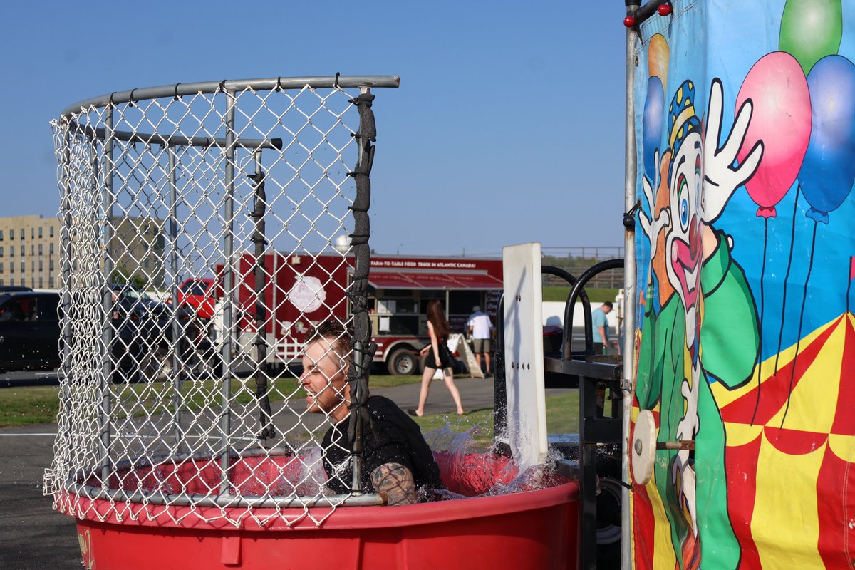 ReprtrPatHealey's tweet photo. Gage Gilby and Braden Langille were dunked multiple times at @sswracing at the car show/food truck rally as part of the Summer Clash 250 kickoff. There were plenty of cars for people to check out like these two did. https://t.co/yHNybstTMe