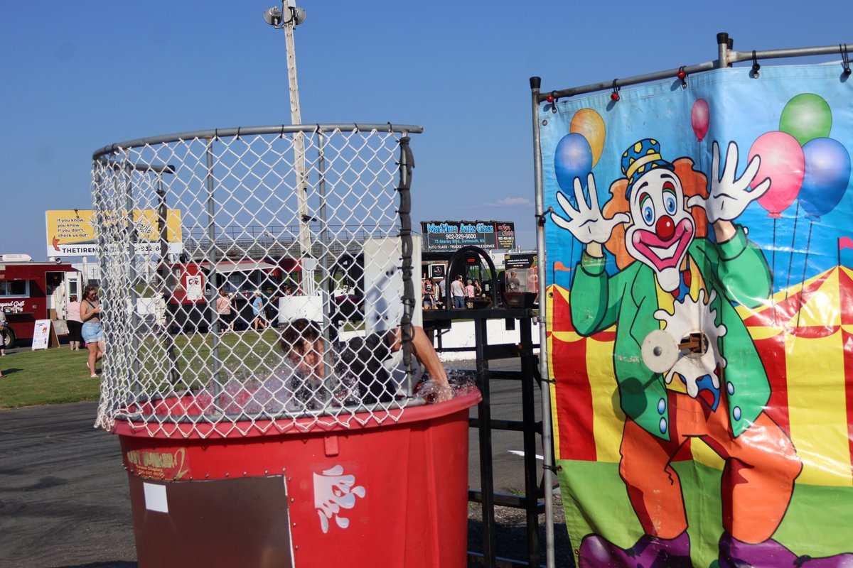 ReprtrPatHealey's tweet photo. Gage Gilby and Braden Langille were dunked multiple times at @sswracing at the car show/food truck rally as part of the Summer Clash 250 kickoff. There were plenty of cars for people to check out like these two did. https://t.co/yHNybstTMe