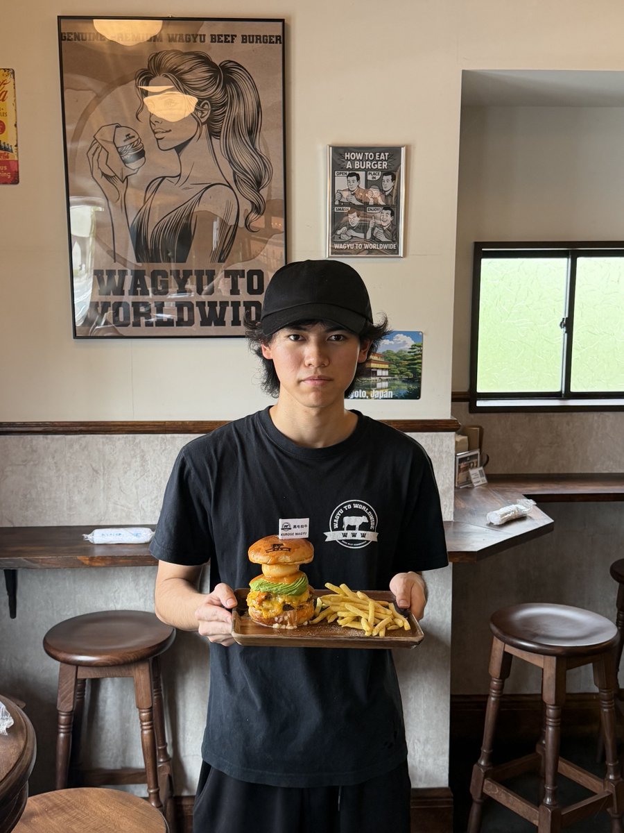 www_k_station's tweet photo. A staff member presents a juicy Wagyu burger with fries inside the cozy Kyoto shop 🍔✨, a great stop before or after teamLab Kyoto.  
Reservations are recommended during busy periods: https://t.co/cdOSrGoi7P  
#kyoto #teamlabkyoto #wagyuburger https://t.co/ydIwduEMA0