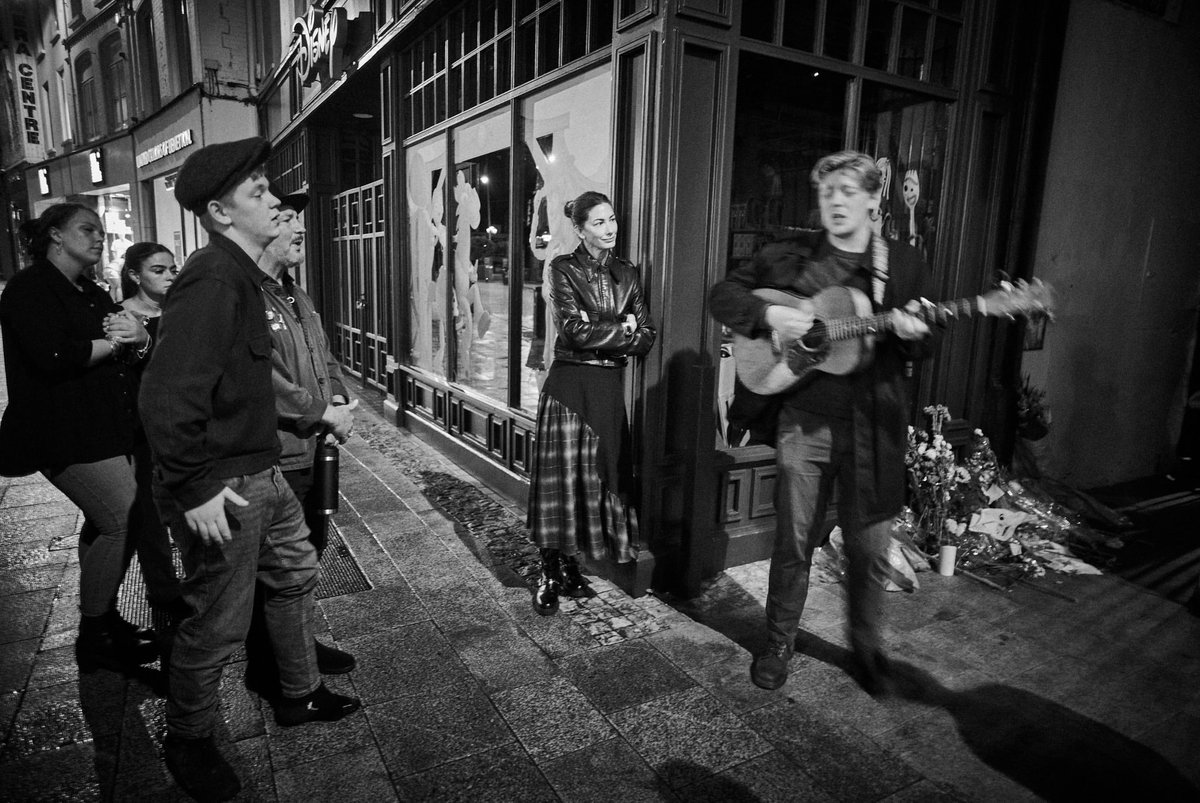 Danny_Clinch's tweet photo. Busking in Glens usual spot with some of his friends after his service is just what he would've wanted . So we did . It was beautiful . 
@Glen_Hansard @eddievedder https://t.co/ZVLdROqFTl