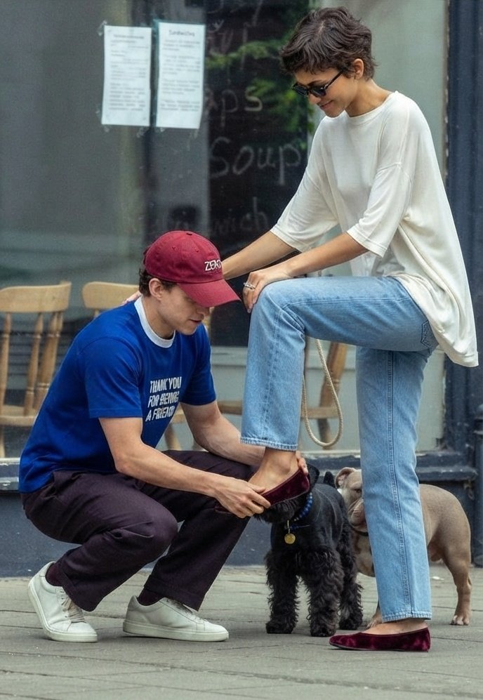 BoinkBuzz's tweet photo. 🚨 𝗡𝗘𝗪! - Zendaya & her husband, Tom Holland were spotted hugging, kissing and having a fun time while on a coffee date in London wearing matching wedding bands, amid rumors of a secret wedding ceremony💍

They are now enjoying a well-deserved break following the success of their 2 Block Buster Movies.

 “THE ODYSSEY” will officially cross $1 Billion this weekend.

“SPIDER-MAN: BRAND NEW DAY” is currently at $1.3 Billion, it's expected to cross $1.7B this weekend.