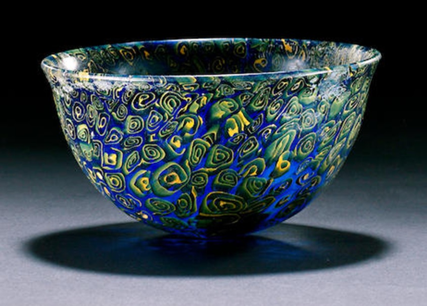 artinsociety's tweet photo. Hellenistic mosaic glass bowl, cobalt blue with yellow/green spirals, fire-polished, with diameter of 5in (13 cm), dating from 2nd/3rd century BC. Convincing 3-D effect of spirals when seen in detail (at R). For details of the ancient technique, see https://t.co/aiINmGda4p https://t.co/39bEN3uj0e