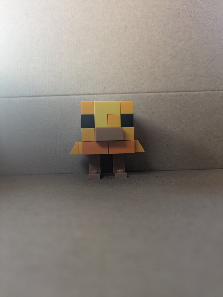 loonadahound's tweet photo. I made a baby Minecraft chicken with legos cause I'm bored thought it was cute https://t.co/84eEExvwEB