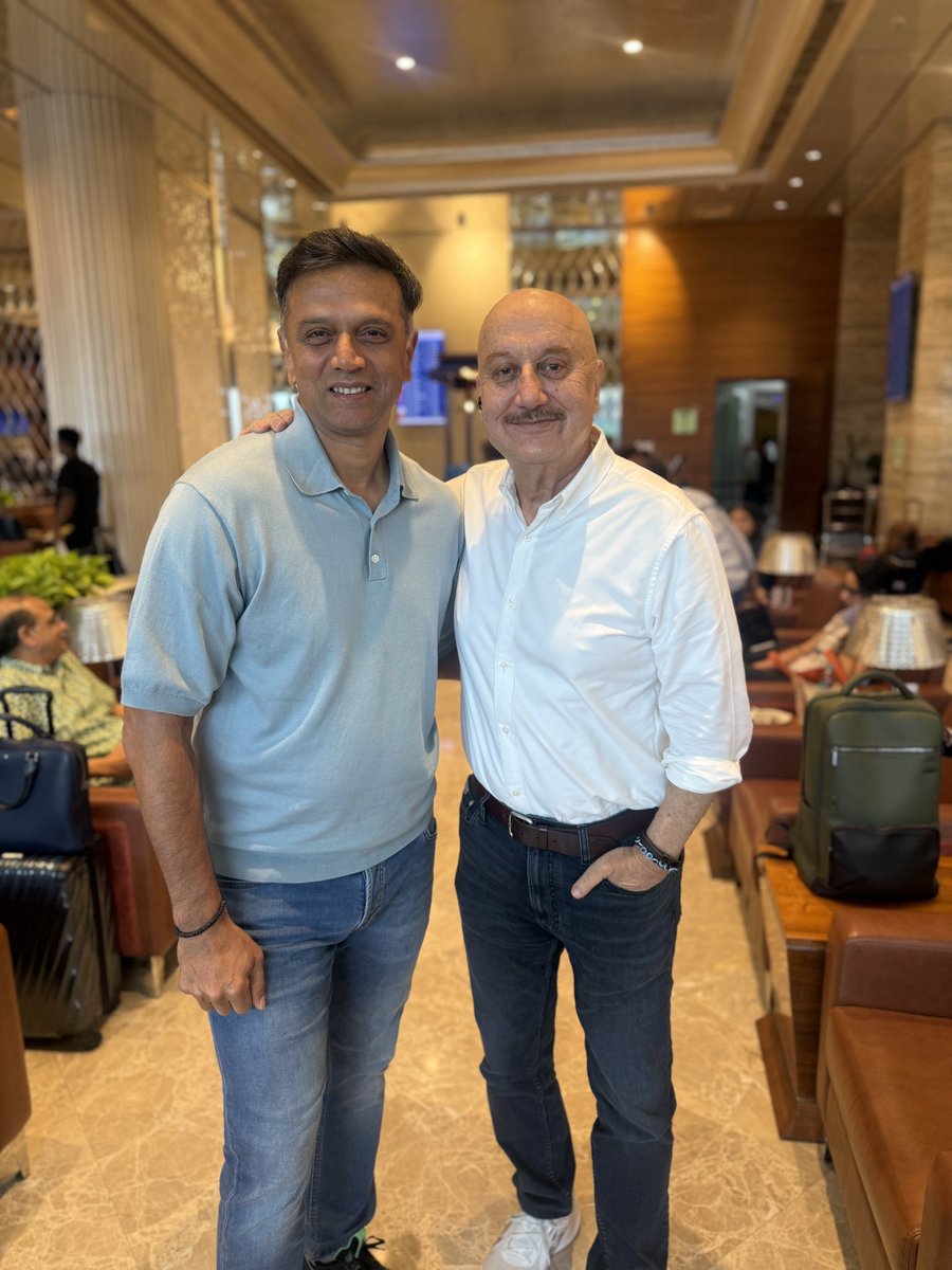 AnupamPKher's tweet photo. Sometimes the best part of travelling isn’t the destination!! It’s the people you unexpectedly meet along the way.😍
A few days ago, I bumped into #RahulDravid at the Mumbai airport. Today, I had the pleasure of meeting #VirenderSehwag on my flight.
Two completely different personalities. Two completely different styles of playing the game. Yet both gave India countless moments of pride and joy.🇮🇳
Rahul inspired us with his quiet strength, discipline and unwavering commitment. Viru thrilled us with his fearless attitude, effortless brilliance and infectious smile.❤️‍🩹
I’ve always admired people who make excellence look effortless. Both Rahul and Viru have done that in their own unique ways.
Thank you, gentlemen, for the memories, the inspiration, and for reminding us that greatness is as much about character as it is about talent. It was wonderful meeting you both. Jai Hind! ❤️😍🇮🇳🇮🇳 @virendersehwag 
#Cricket #TheWall #Viru