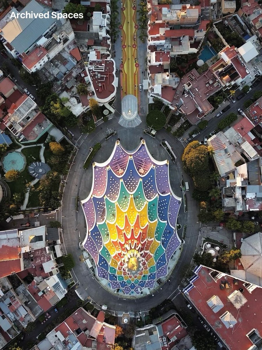 hutdesigns's tweet photo. This giant colorful pyramid is easily the most unique modern church design you will ever see in the world https://t.co/GKjhivotU6
