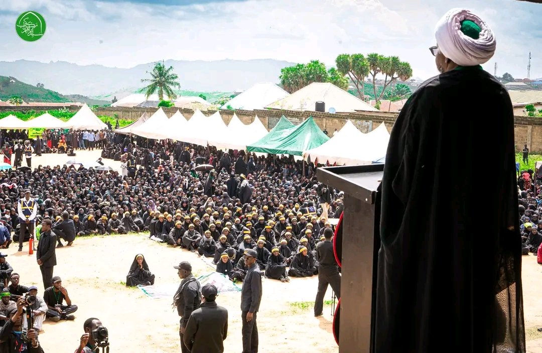 AlkazeemY's tweet photo. Sheikh Zakzaky Declares the School of Imam Husain the Path to Justice, Dignity, Ultimate Victory

The Leader of the Islamic movement, His Eminence, Sheikh Ibraheem Zakzaky (H) delivered the closing address of this year's Arba'een commemoration of Imam Husain (A.S.) on Tuesday, 20 Safar 1448 AH, corresponding to 4 August 2026. The event was held at the Suleja Township Stadium, located on the outskirts of Nigeria's Federal Capital Territory Abuja.

In his address, Shaikh Ibraheem Zakzaky (H) reminded participants that the 20th of Safar marks the fortieth day after the martyrdom of Imam Husain (A.S.) members of his household, and his loyal companions. He explained that the observance of Arba'een has been an established Islamic tradition since 61 AH, when the distinguished Companion, Jabir ibn Abdullah al-Ansari (RA), became the first pilgrim to visit the grave of Imam Husain (A.S.) following the tragedy of Karbala. According to the Leader, Jabir stood at the grave, wept, and called upon his beloved Imam, despite knowing that no response would be heard.

The Leader (H) quoted a narration transmitted by Jabir (RA), in which the Messenger of Allah (S) said: "Whoever loves a people will be resurrected with them, and whoever loves the deeds of a people will share with them in their deeds.

He then declared: "Bear witness that we love Husain, we love the family of Husain, and we love the companions of Husain. We cherish them and their noble deeds, and we pray that Allah resurrects us in their company.

Reflecting on the annual Arba'een pilgrimage in Karbala, the Leader stressed the profound significance of the occasion, describing Arba'een as one of the defining characteristics of a true believer. He cited the well-known narration of Imam Hasan al-Askari (A.S.), which identifies the visitation (Ziyarat) of Imam Husain (A.S.) on Arba'een as one of the five distinguishing signs of a believer, explaining that this act of devotion may be performed either by physically visiting the shrine or by offering salutations from afar.

He further observed that the commemoration of Arba'een has grown into a global phenomenon, with believers across both the East and the West marking the occasion. He described this worldwide observance as a manifestation of preserving and reviving the legacy of the Ahlul Bayt (A.S.).

The Leader also recalled the historic sermon of Sayyida Zainab (A.S.) before Yazid, in which she proclaimed that he would never succeed in erasing the remembrance of the Ahlul Bayt (A.S.). He noted that, centuries later, Imam Husain (A.S.) continues to be remembered and honoured, while Yazid (LA) remains universally condemned.

He remarked: "If you are offended when the accursed are cursed, then you yourself are among the accursed. For no one is displeased by the condemnation of the accursed except the accursed themselves.

The Leader explained that Allah has appointed the Ahlul Bayt (A.S.) as the criterion by which truth is distinguished from falsehood. He reflected on Imam Husain's (A.S.) defining choice between submission to tyranny and martyrdom, emphasising that the Imam chose martyrdom over humiliation. Reaffirming the immortal declaration, Hayhāt Minnā al-Dhillah ("Far be it from us to accept humiliation"), he stressed that the followers of Imam Husain (A.S.) will never submit to oppression.

Shaikh Zakzaky stated: "Allah has honoured us and elevated our dignity; therefore, we shall never accept to live under the domination of the contemptible.

The Leader further stated that the School of Imam Husain (A.S.) has inspired generations with invaluable lessons of faith, sacrifice, and steadfastness. He cited the Islamic Revolution in Iran, forty-seven years ago, as one of the fruits of those teachings. Despite decades of sanctions and sustained external pressure, he noted, Iran has continued to grow stronger, developing the capacity to defend itself against its adversaries an achievement he described as a source of pride for Muslims.