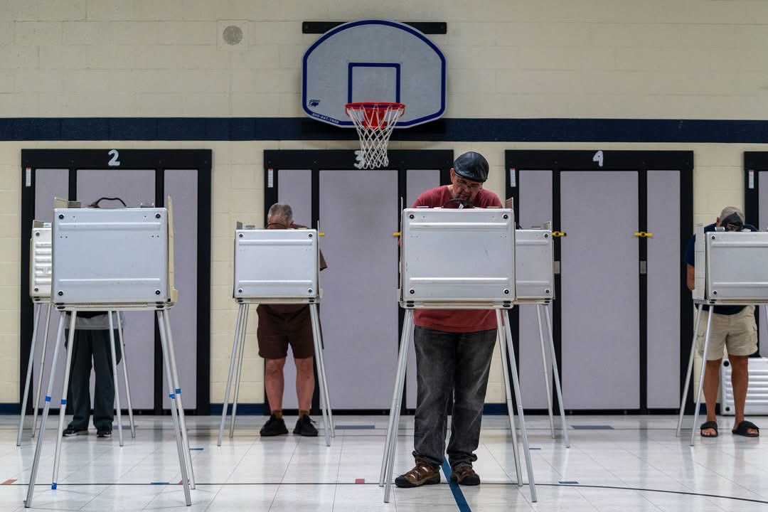 visualdavid's tweet photo. Republican gubernatorial candidate and U.S. Rep. John James gestures toward his son while casting his ballot at Morgan Elementary School during Michigan’s primary election in Shelby Township — photos for @freep. https://t.co/3HiFjMUbzS