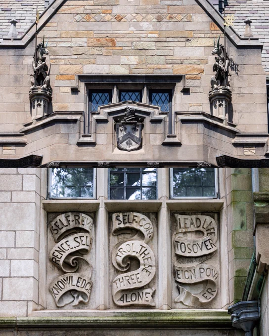 Gothic architecture details on a Yale University building. The facade features ornate stone carvings, including phrases such as "SELF-REVERENCE, SELF-KNOWLEDGE, SELF-CONTROL" and "LEAD LIFE TO SOURCES OF FOREIGN POWER." The building includes decorative statues and a crest.