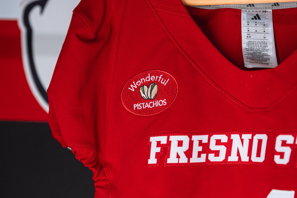 FSAthletics's tweet photo. All Fresno State Athletics programs will feature a jersey patch representing one of three @Wonderful  brands – Wonderful Pistachios, POM Wonderful, Wonderful Halos – creating a first-of-its-kind platform that aligns multiple brands from a single corporate portfolio across different Bulldog teams.
#WonderfulCompanyPartner