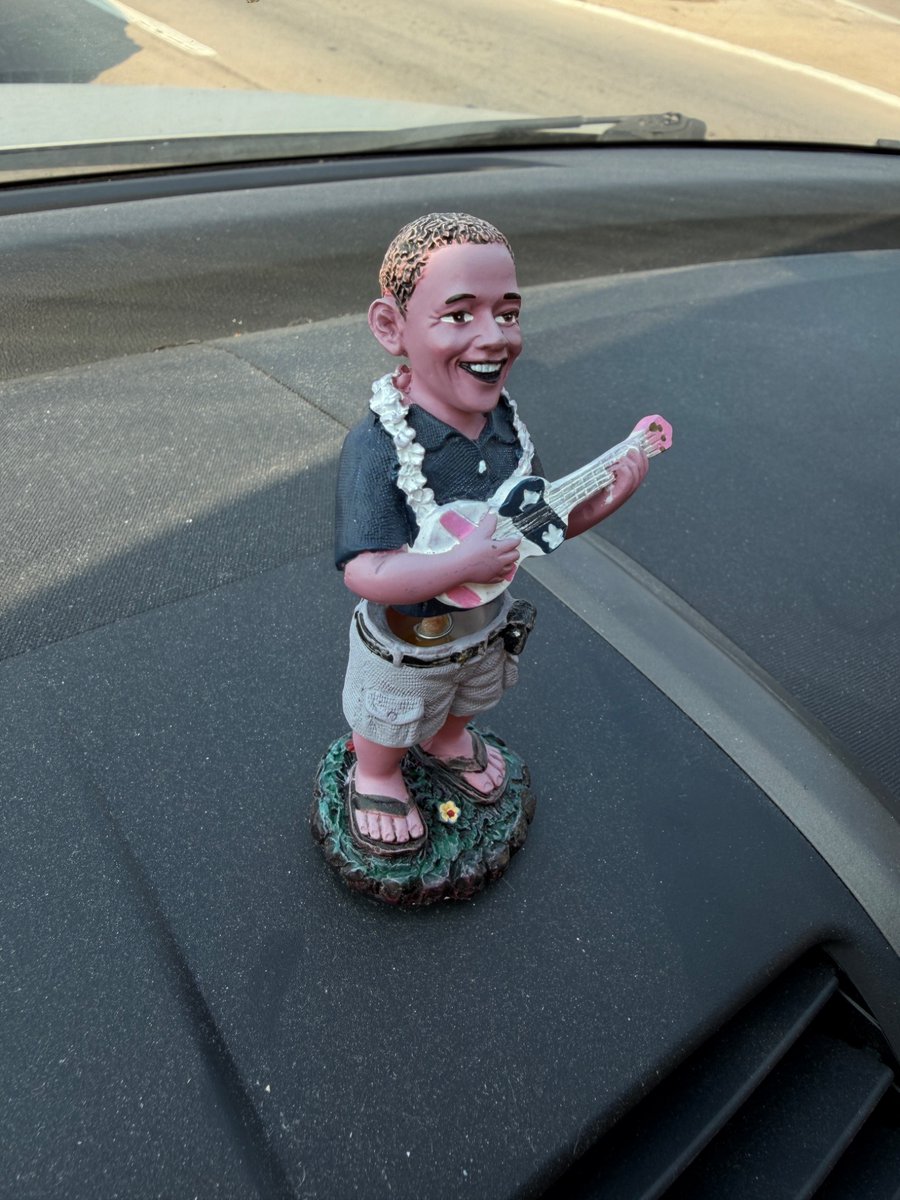 blueboxphreak's tweet photo. Year 5 of Obama on my dashboard. The sun has turned his skin pink and his hair is starting to go white. He has driven over 40,000 miles with me yet can still go crazy on that ukulele https://t.co/s5vCNQFG5c