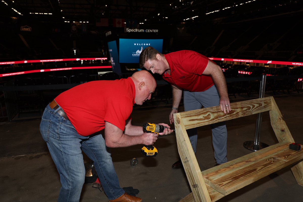 CokeCCBCC's tweet photo. Yesterday, more than 50 Coca-Cola Consolidated senior leaders from across our territory came together with the @hornets executive team at the @spectrumcenter to serve others. 

Our Teammates worked together to assemble new porch benches and home maintenance kits for @RebldgTogthr, supporting their mission to repair homes, revitalize communities and rebuild lives. 

At Coca-Cola Consolidated, service isn’t just what we do, it’s who we are. ❤️ Thank you to everyone who participated and helped pour back into our local communities.