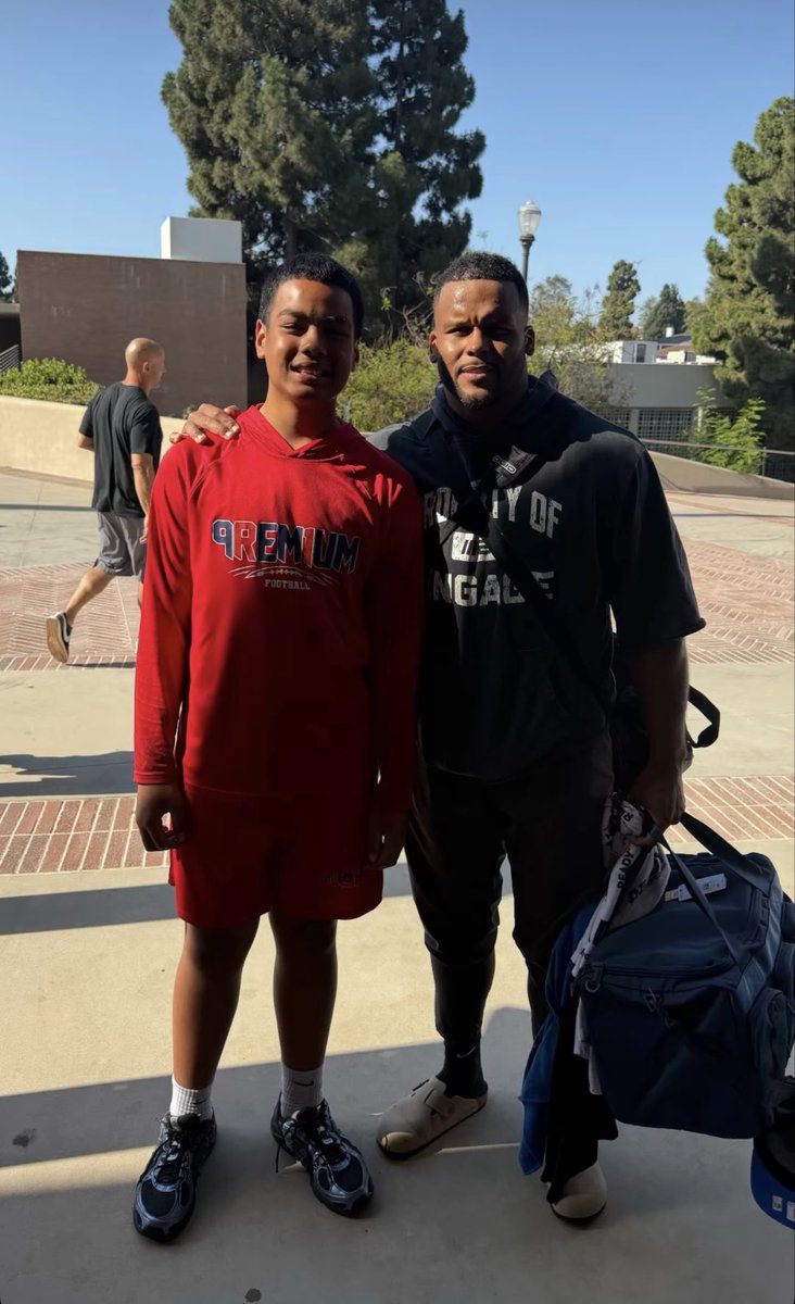Iampoko_t's tweet photo. Caught Aaron Donald @ UCLA training today this gives me a feeling he is definitely coming back. My lil nephews asked the question. Let’s go!! @AaronDonald97 #ramshouse  #nfl https://t.co/8sD0K4YVln