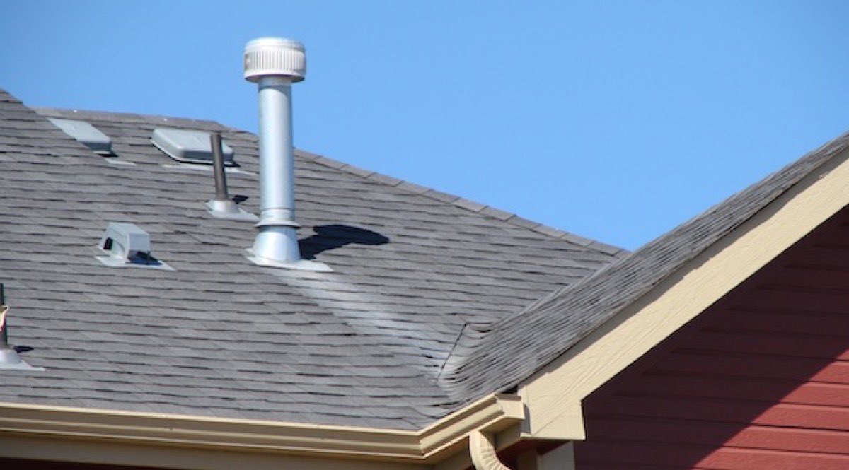 antonia_mdprjct's tweet photo. Let's talk about roofs.  

Roofs with "warts," in particular.  

In residential construction, several systems require exhaust or venting.  Guess where those pipes/flues go?  

They go up & out through the roof.

In many cases, this is inevitable.  

Aside from the unsightliness of these roof penetrations, they are a weak roofing spot.  Even when properly installed, they are a potential point for leaks, especially over time.  Especially in snowy climates.

Additionally, some very specific requirements determine the projection & proximity of vents & flues, which makes it tough to hide them.  So, what if there was a way not to put vents through the roof?  Many plumbers will say "impossible."

Ladies & gents, I'd like to introduce you to Jimmy.  Master plumber & artist.  This is his work.  He combined all plumbing vents into a single stack & brought it up the chimney/feature wall.

(Image while the house was in construction)

When I told Jimmy my intent to have no roof penetrations, he was intrigued. He'd never done that before.  I explained the low-pitch roof design & the intent to have the snow melt slowly on the roof.  Immediately, he understood why we couldn't put holes through the roof.

He quickly came up with routing that would allow him to combine vents & pop out at a single location while maintaining pitch & length requirements.  His pride in meeting the challenge was inspiring & he was thrilled with the result.

Working with teams willing to stretch to do things they've never done before is a privilege & getting to experience the built result is why I do what I do.  

Sure, there are 'easier' ways.  I could have built a house with a warty roof, but I didn’t want to.