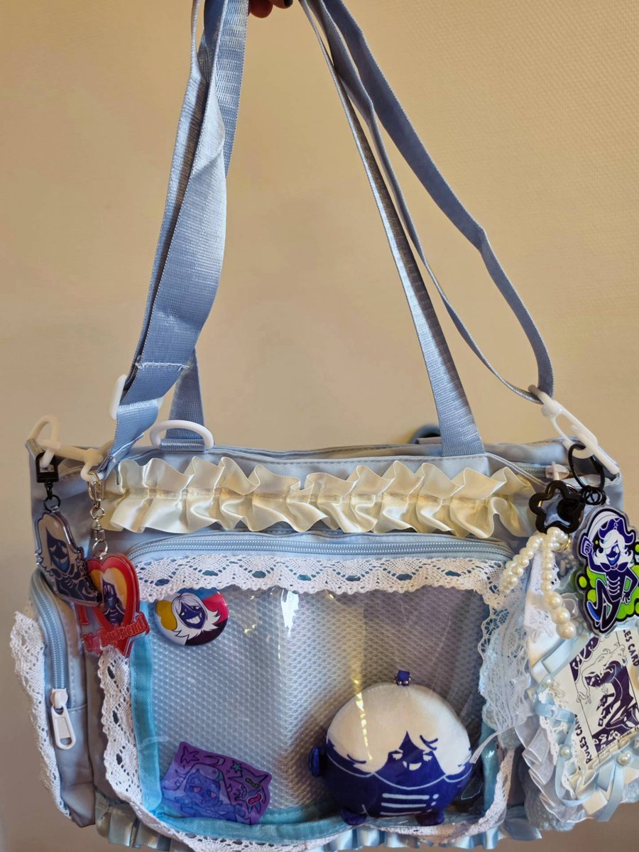 rouxls's tweet photo. It took a while for all of these to arrive and others stuff still need to be mailed but.... Rouxls itabag in progress???!!! I'm so happye... (Stuff on it may change whenever I get the other items I've ordered)

#deltarune #rouxlskaard https://t.co/hyk23wDozX