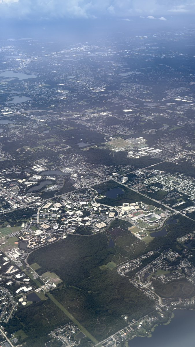 ucfmusicknight's tweet photo. Caught these pics out the window of my airplane coming back to Orlando from TN!  It’s the Bounce House! https://t.co/brSefziciK