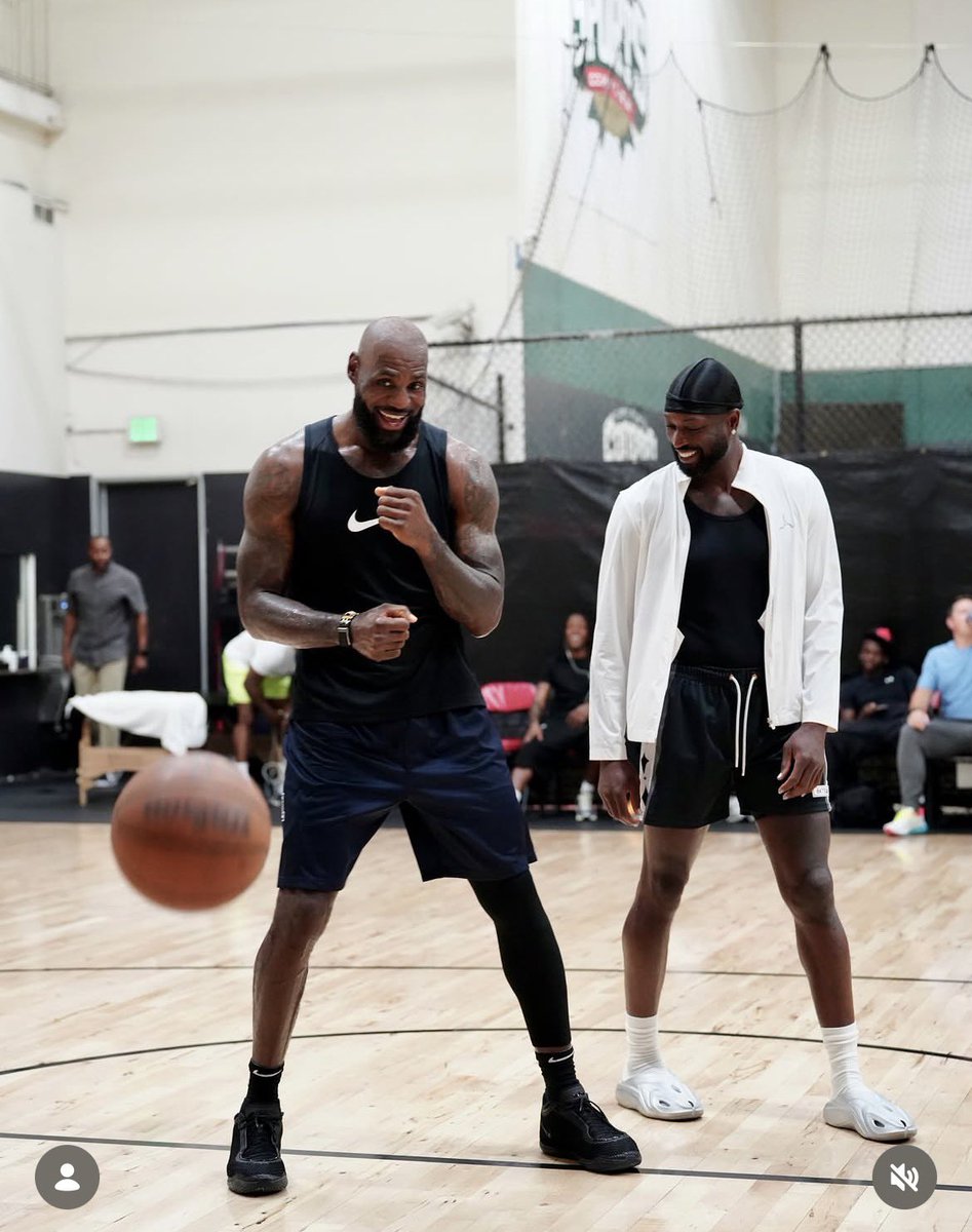 HeatvsHaters's tweet photo. LeBron and DWade reunited. 

2012 and 2013 champs 🔥

(should’ve been in Miami) https://t.co/ZwHmAUDCCB