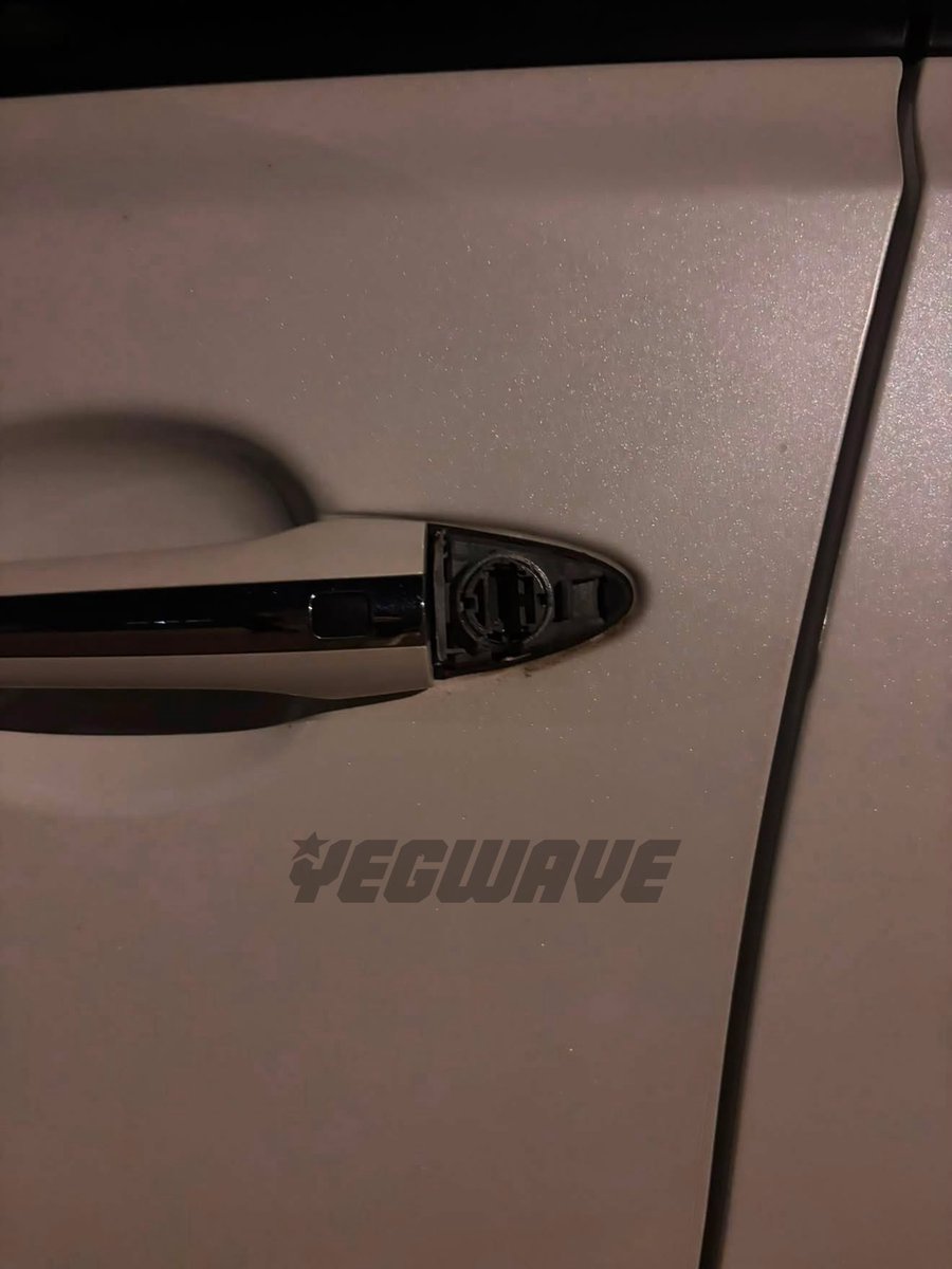 yegwave's tweet photo. A follower has shared a video of two people attempting to break into his car overnight in Summerside.

They ran away after the car owner shouted, but not before damaging and breaking off part of the door lock assembly. https://t.co/HtI1NiQe8g