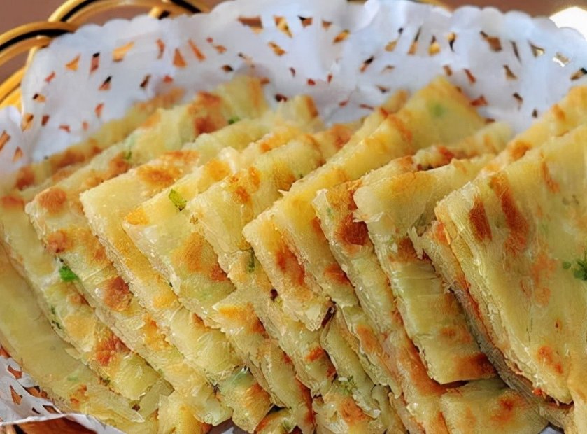 SurajkumarbcBc's tweet photo. Craving late-night bites Freshly fried crispy scallion pancake from the street cart, hot out the griddle—every bite hits different https://t.co/pq1O0WzFsP