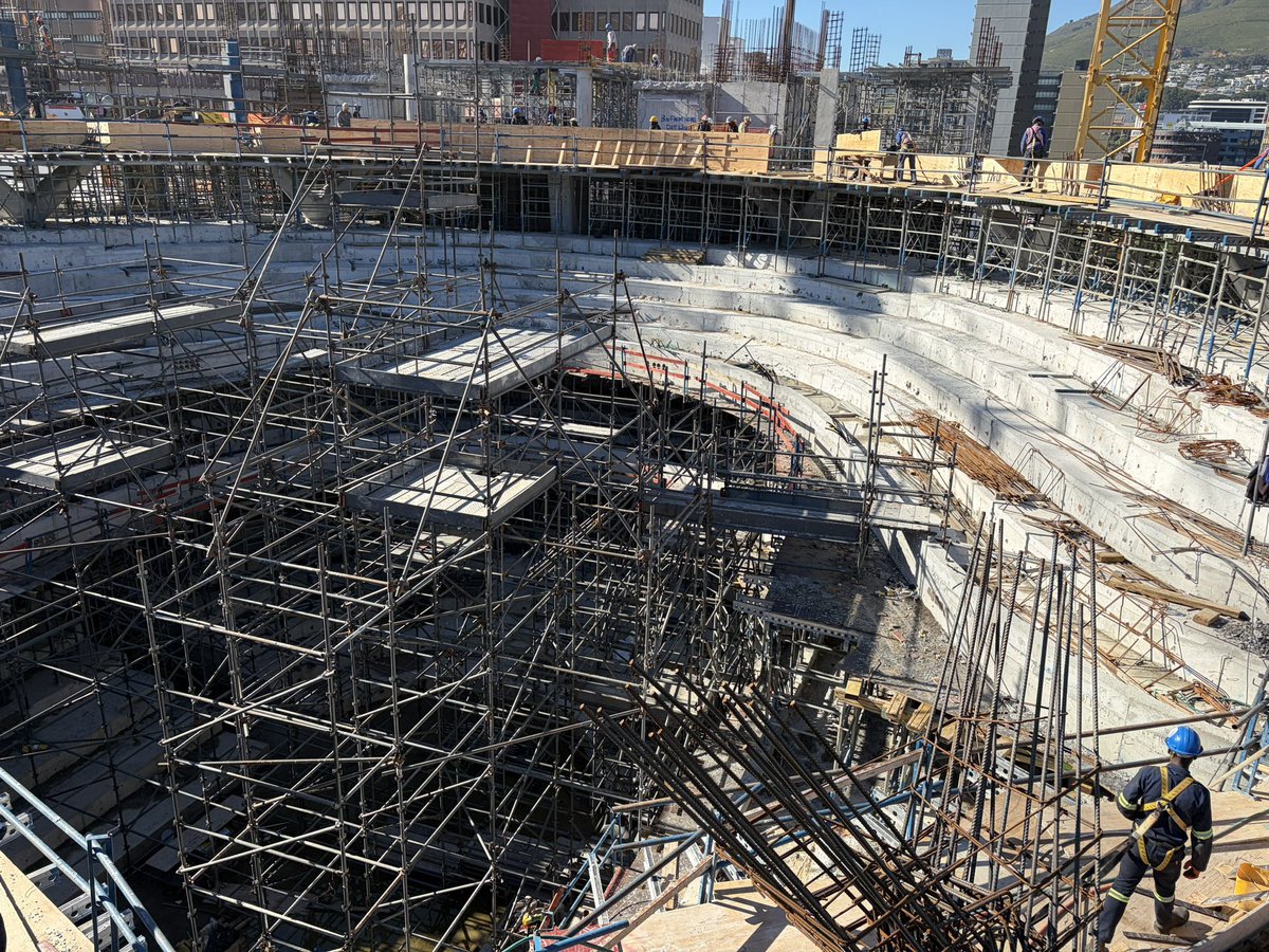 Askash's tweet photo. The rebuilding of Parliament in Cape Town is now 76% complete🏗️

The project remains within the R4.6bn budget, with 52% currently spent. 

The National Assembly building will accommodate 600 people on the floor and another 600 in the public galleries. 

This is according to the Development Bank of Southern Africa. Video & images: EWN
