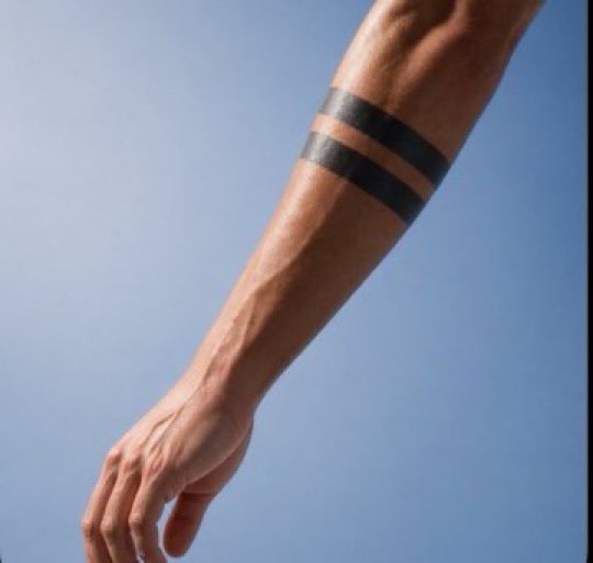 PrimeHendry's tweet photo. If you see someone with this tattoo run very far away😭, @grok tell them what it means 👇 https://t.co/b4IgsR8M5Z
