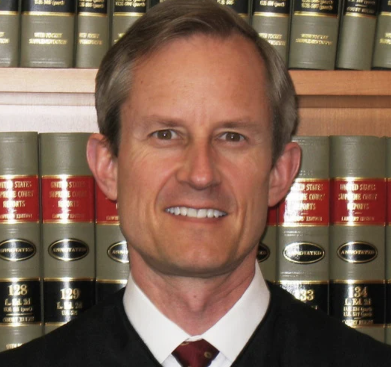 funder's tweet photo. Judge Philip Brimmer was put on the bench by George W. Bush.

On Monday he threw Trump's Justice Department out of his courtroom and dismissed their demand for Colorado's voter file with prejudice. That means they don't get to come back and try again.

21 dismissals. 31 lawsuits. Zero wins.

https://t.co/zwIfmTeqSU