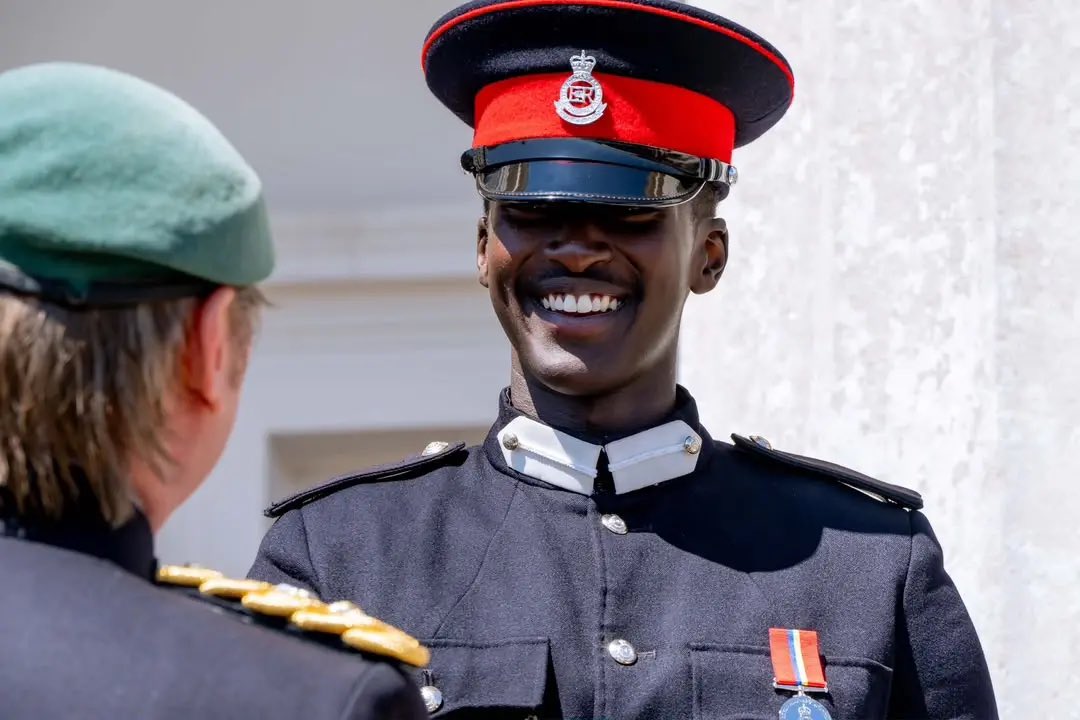 kamukamafredie's tweet photo. Ugandan Officer Cadet Ruhamya Kainerugaba Graduates from Sandhurst

Officer Cadet Ruhamya Kainerugaba, son of Uganda’s Chief of Defence Forces (CDF), Gen Muhoozi Kainerugaba, has graduated from the Royal Military Academy Sandhurst in the United Kingdom after completing the academy’s prestigious 44-week Officer Commissioning Course.

General Muhoozi attended the Sovereign’s Parade in Surrey to witness his son’s commissioning. Ahead of the ceremony, he was received by Major General Nick Cowley OBE, the Academy Commandant, who presented him with a Sandhurst Alumni medal—a distinction introduced after Gen. Kainerugaba’s own time at the academy.

Ruhamya was commissioned alongside fellow Ugandan Officer Cadet Andrew Bakira and other British and international cadets.

The graduation carries particular significance for the Kainerugaba family. Gen. Muhoozi himself graduated from Sandhurst in 2000, and in the weeks leading up to the parade, he shared photographs comparing his own officer training with his son’s, reflecting on a “father and son going through the same hardships, separated by 27 years.”

The Sandhurst course is widely regarded as one of the world’s most demanding military leadership programmes, covering tactics, weapons systems, fieldcraft, operational planning, ethics and command under pressure.

Addressing the newly commissioned officers, General Sir Roly Walker, Chief of the General Staff, warned that the global security environment is changing rapidly and that military dominance can no longer be taken for granted.

He reminded the young officers of their central responsibility: to earn the trust of the soldiers they lead and be prepared to fight and win their nations’ battles.

“Serve to Lead”—the academy’s enduring motto—was at the heart of his message.

As Ruhamya and his fellow graduates begin their careers, they now return to their respective armed forces, including the Uganda Peoples’ Defence Forces (UPDF), to serve as commissioned officers.