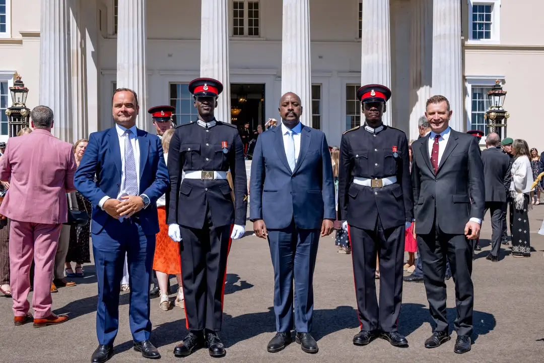 kamukamafredie's tweet photo. Ugandan Officer Cadet Ruhamya Kainerugaba Graduates from Sandhurst

Officer Cadet Ruhamya Kainerugaba, son of Uganda’s Chief of Defence Forces (CDF), Gen Muhoozi Kainerugaba, has graduated from the Royal Military Academy Sandhurst in the United Kingdom after completing the academy’s prestigious 44-week Officer Commissioning Course.

General Muhoozi attended the Sovereign’s Parade in Surrey to witness his son’s commissioning. Ahead of the ceremony, he was received by Major General Nick Cowley OBE, the Academy Commandant, who presented him with a Sandhurst Alumni medal—a distinction introduced after Gen. Kainerugaba’s own time at the academy.

Ruhamya was commissioned alongside fellow Ugandan Officer Cadet Andrew Bakira and other British and international cadets.

The graduation carries particular significance for the Kainerugaba family. Gen. Muhoozi himself graduated from Sandhurst in 2000, and in the weeks leading up to the parade, he shared photographs comparing his own officer training with his son’s, reflecting on a “father and son going through the same hardships, separated by 27 years.”

The Sandhurst course is widely regarded as one of the world’s most demanding military leadership programmes, covering tactics, weapons systems, fieldcraft, operational planning, ethics and command under pressure.

Addressing the newly commissioned officers, General Sir Roly Walker, Chief of the General Staff, warned that the global security environment is changing rapidly and that military dominance can no longer be taken for granted.

He reminded the young officers of their central responsibility: to earn the trust of the soldiers they lead and be prepared to fight and win their nations’ battles.

“Serve to Lead”—the academy’s enduring motto—was at the heart of his message.

As Ruhamya and his fellow graduates begin their careers, they now return to their respective armed forces, including the Uganda Peoples’ Defence Forces (UPDF), to serve as commissioned officers.
