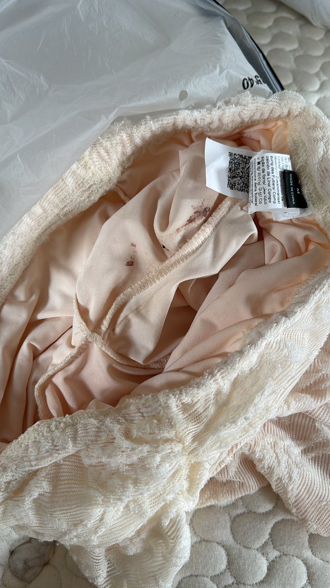 AliceeGreig's tweet photo. Anyone else received clothes from shein in this condition? Absolutely disgusting and fkin vile. @SHEIN_Official how tf was this missed when it was returned?!?! It’s either blood or shit. https://t.co/QCeiahAywG