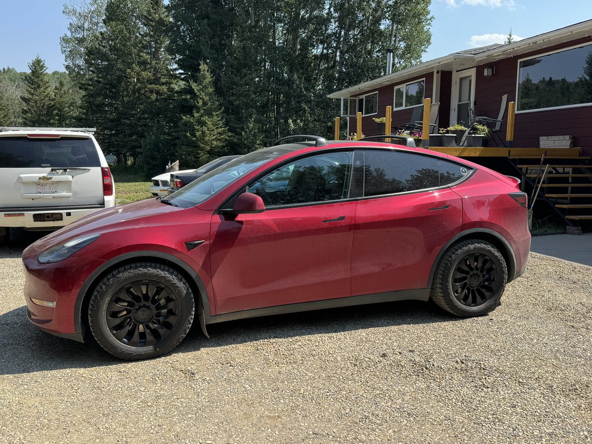 Jeff_Mueller's tweet photo. I tossed a carbon fiber spoiler on last week to help visually define the edge of the boot lid…. 

Just in case you needed some more visual motivation. ;)

As an aside, fair and square the efficiency is down slightly, but I haven’t done the math yet to tell you by how much exactly.