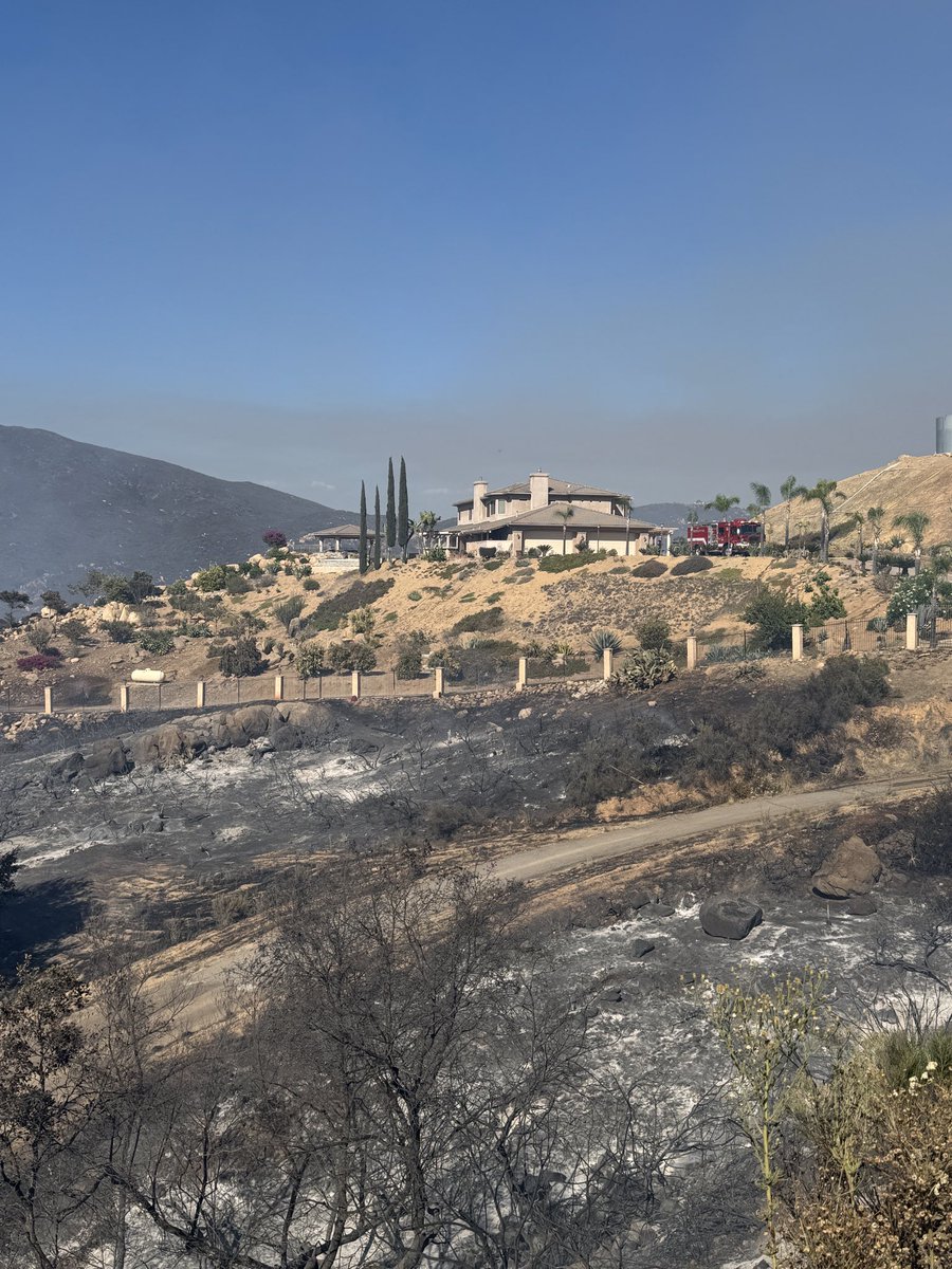 CALFIRESANDIEGO's tweet photo. #BeaverFire containment is now 75% and 20acres burned. Residence experience first hand the importance of defensible space. Here is a great example of the fire stopping just outside the property. https://t.co/cP1NoWZldT